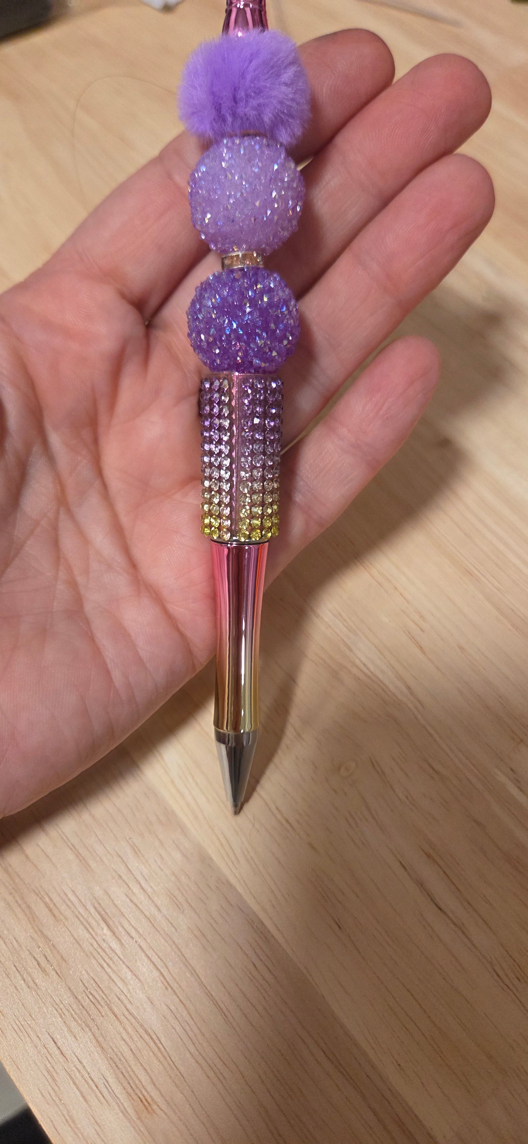 Purple glam beaded pen with rose gold rhinestone body and pom pom