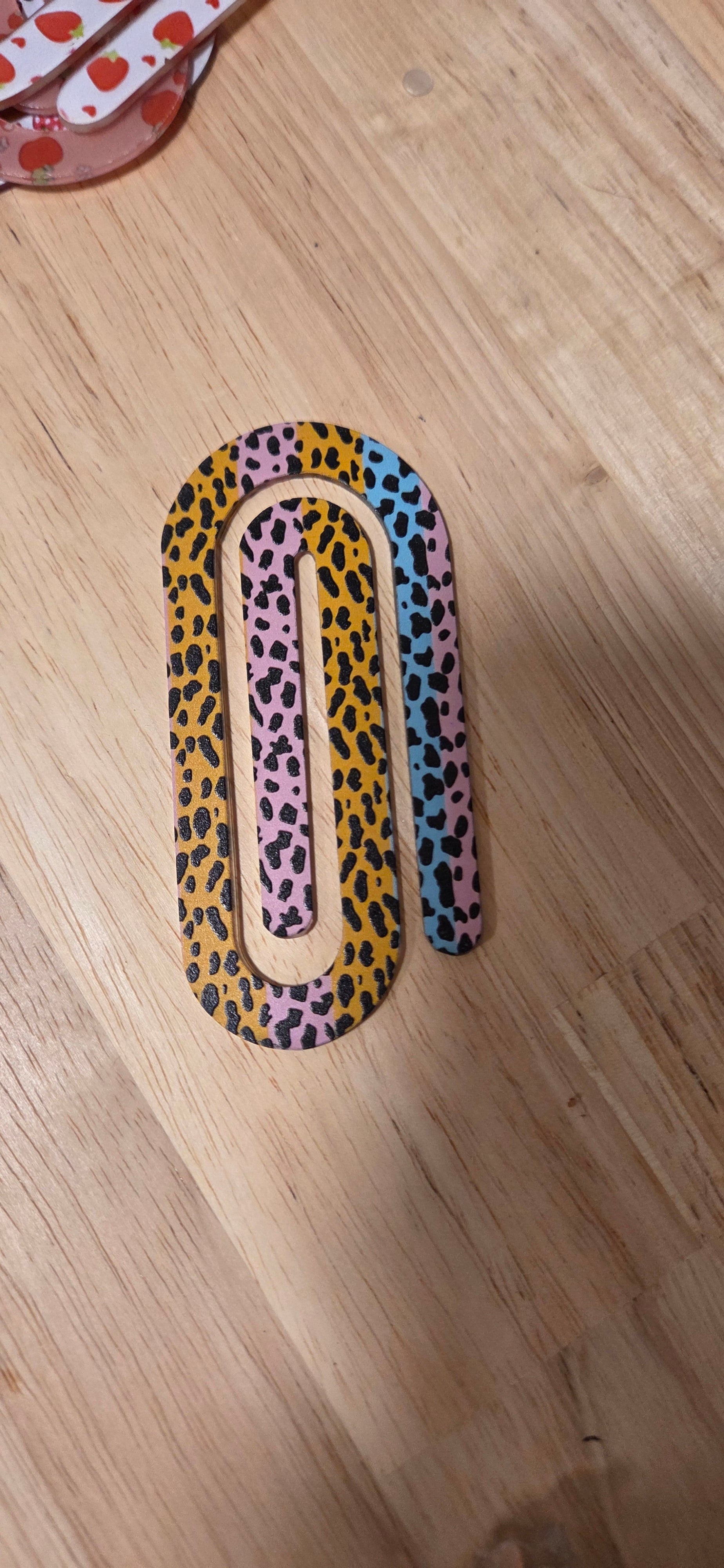 Single jumbo color block leopard print paper clip in yellow pink and blue