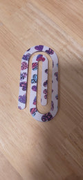 Single jumbo white leopard heart print paper clip in purple pink and blue