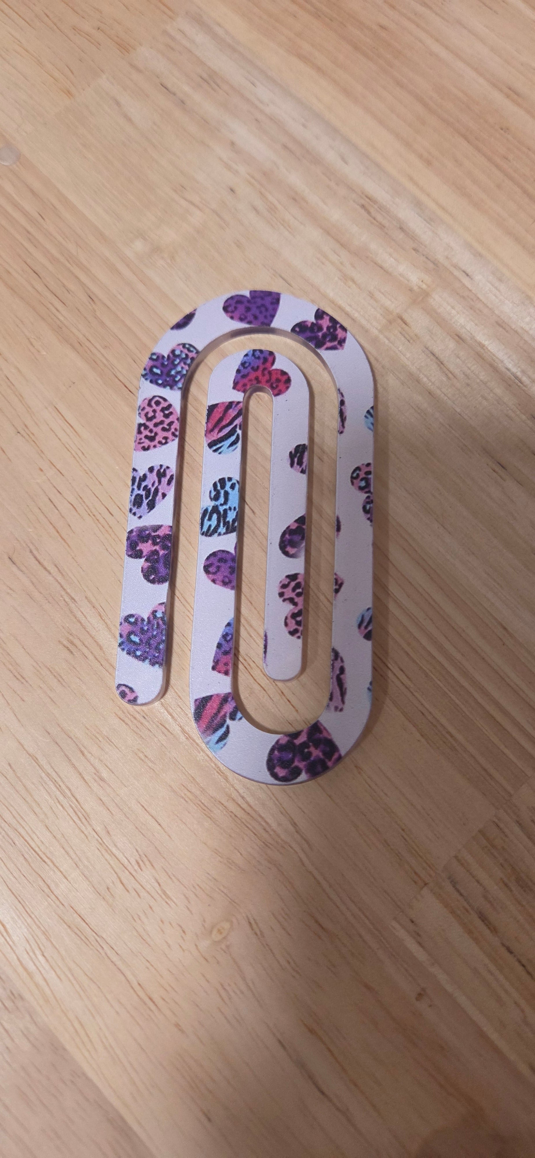 Single jumbo white leopard heart print paper clip in purple pink and blue